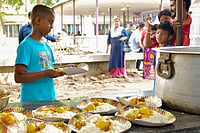 IMAGO / Middle East Images
 : World Food Day in Agartala: Children receive food from a complimentary stall organized by the Rotary Club on the occasion of World Food Day in Agartala, Tripura, on October 16, 2025. Volunteers distributed meals and promoted awareness about hunger and food security
