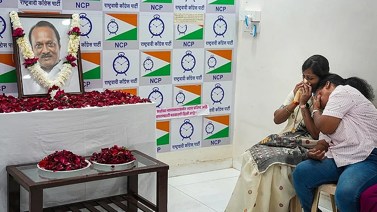 Mumbai: NCP workers mourn the death of party leader and Maharashtra Deputy Chief Minister Ajit Pawar, at the party office in Mumbai. Pawar and four others were killed after an aircraft carrying them crashed near Baramati on Wednesday. - | Photo: PTI/Shashank Parade
