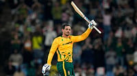 SA Vs WI Highlights, 2nd T20I: De Kock’s Blazing Century Powers South Africa To Seven-Wicket Win (AP Photo/Themba Hadebe) : South Africa's batsman Quinton de Kock raises his bat after reaching a century during the T20 International cricket match between South Africa and West Indies, in Centurion, South Africa, Thursday, Jan. 29, 2026.