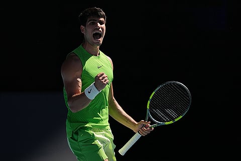 Carlos Alcaraz of Spain reacts during his semifinal match against Alexander Zverev of Germany at the Australian Open tennis championship in Melbourne, Australia.