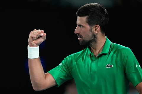 Novak Djokovic of Serbia reacts during his semifinal match against Jannik Sinner of Italy at the Australian Open tennis championship in Melbourne, Australia.