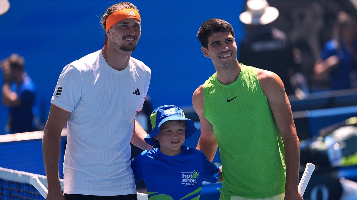 Carlos Alcaraz, right, of Spain and Alexander Zverev of Germany pose for a photo. - AP/Aaron Favila