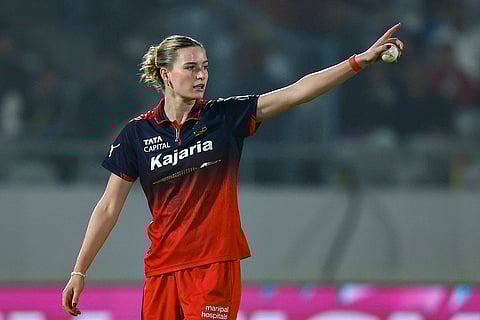 Royal Challengers Bengaluru’s Lauren Bell reacts during a Women's Premier League (WPL) 2026 T20 International cricket match between Royal Challengers Bengaluru and UP Warriorz, at BCA Stadium, in Vadodara, Gujarat. 
