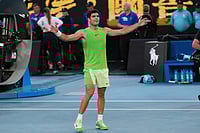 Australian Open 2026: Carlos Alcaraz Beats Alexander Zverev In Straight Sets To Reach His Maiden AO Final | Photo: AP/Dita Alangkara : Carlos Alcaraz of Spain celebrates after defeating Alexander Zverev of Germany in their semifinal match at the Australian Open tennis championship in Melbourne, Australia.