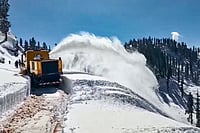 | Photo: PTI : A machine being used by Border Roads Organisation (BRO) to clear snow from Budhal-Mahore-Gool road, in Rajouri, Jammu and Kashmir.