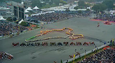 Armed forces personnel form an Indian map formation during the Beating Retreat ceremony, marking the conclusion of Republic Day celebrations, at Vijay Chowk, in New Delhi. 