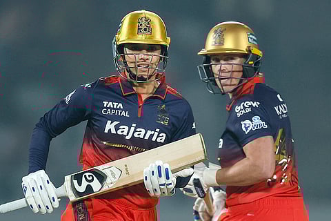 Royal Challengers Bengaluru's captain Smriti Mandhana and Grace Harris during a Women's Premier League (WPL) 2026 T20 International cricket match between Royal Challengers Bengaluru and UP Warriorz, at BCA Stadium, in Vadodara, Gujarat. 