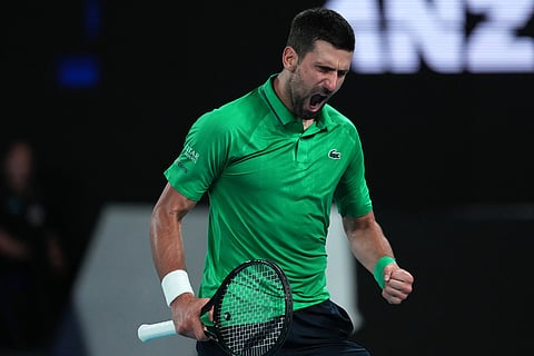 Novak Djokovic of Serbia reacts during his semifinal match against Jannik Sinner of Italy at the Australian Open tennis championship in Melbourne, Australia.