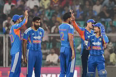 India’s Arshdeep Singh celebrates with teammates after taking the wicket of New Zealand's Tim Seifert during the fifth and final T201 cricket match between India and New Zealand, at the Greenfield International Stadium, in Thiruvananthapuram, Kerala.