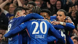 Photo: AP : Chelsea players celebrate after scoring during the Champions League match between Chelsea and Pafos in London.