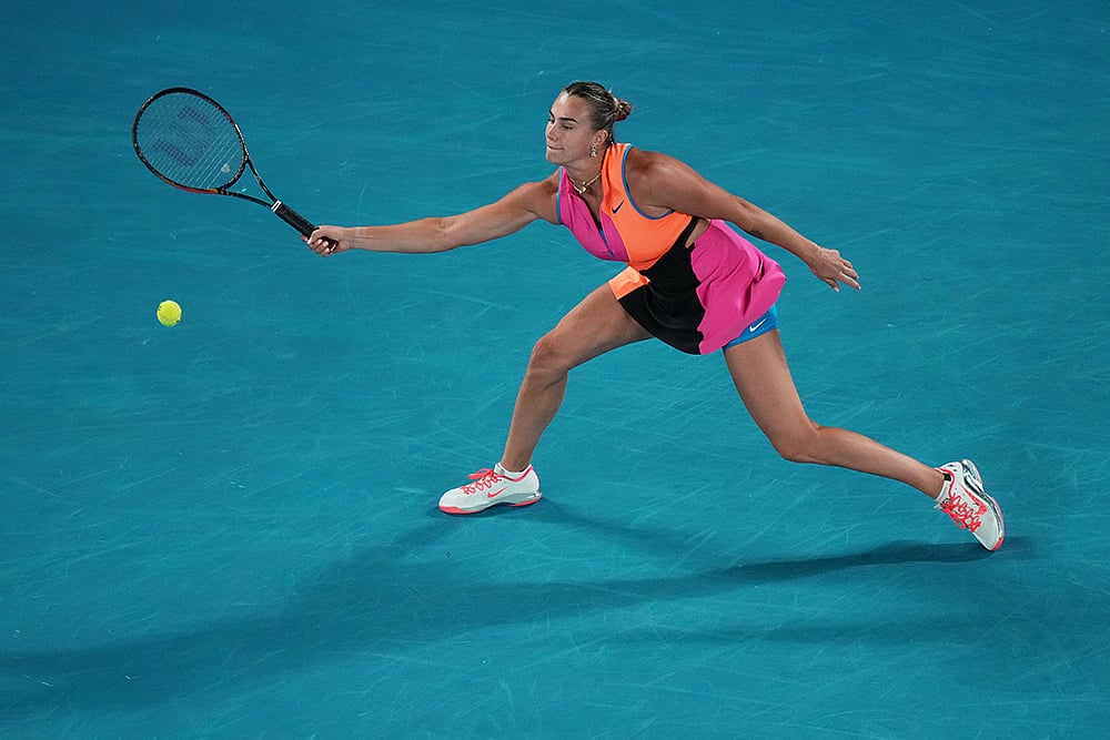 Aryna Sabalenka of Belarus returns a shot from Elena Rybakina of Kazakhstan during the women's singles final at the Australian Open tennis championship in Melbourne, Australia. - | Photo: AP/Dar Yasin