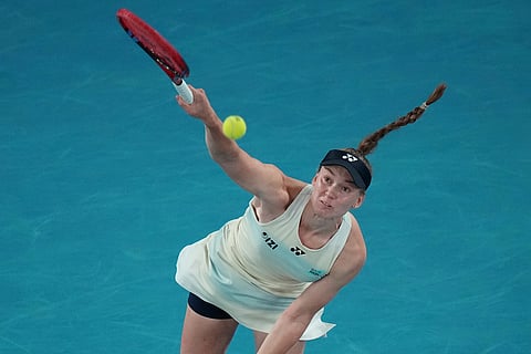 Elena Rybakina of Kazakhstan serves the ball to Aryna Sabalenka of Belarus during the women's singles final at the Australian Open tennis championship in Melbourne, Australia.