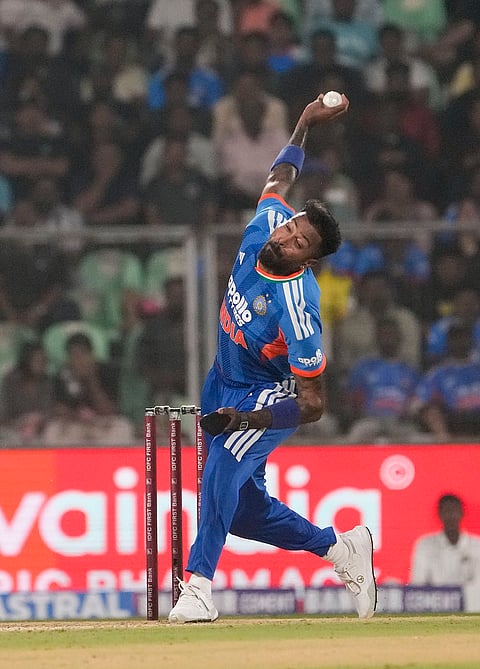 India's Hardik Pandya bowls a delivery during the fifth and final T201 cricket match between India and New Zealand, at the Greenfield International Stadium, in Thiruvananthapuram, Kerala.