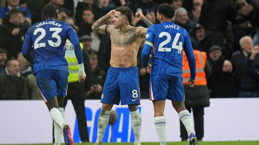 Enzo Fernandez, centre, celebrates after scoring his side's third goal during the English Premier League match between Chelsea and West Ham United in London. - Photo: AP