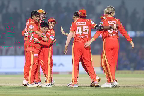 Gujarat Giants' players celebrate after winning a Women's Premier League (WPL) 2026 T20 International cricket match between Gujarat Giants and Mumbai Indians, at BCA Stadium, in Vadodara, Gujarat. 