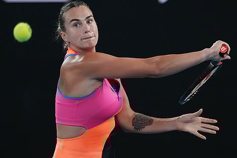 Aryna Sabalenka of Belarus plays a backhand to Elena Rybakina of Kazakhstan during the women's singles final at the Australian Open tennis championship in Melbourne, Australia.