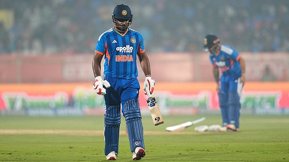 India's Sanju Samson walks off the field after losing his wicket during the fourth T20 cricket match between India and New Zealand in Visakhapatnam. - | Photo: AP/Aijaz Rahi