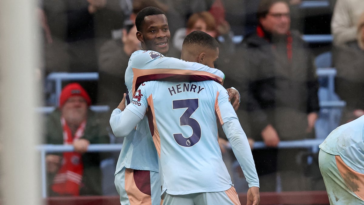 Dango Ouattara celebrates with Rico Henry after scoring at Villa Park. - null