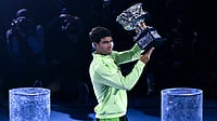Australian Open Final: Alcaraz Denies Djokovic To Become Youngest Winner Of All Four Majors - Data Debrief Carlos Alcaraz holds the Norman Brookes Challenge Cup aloft.