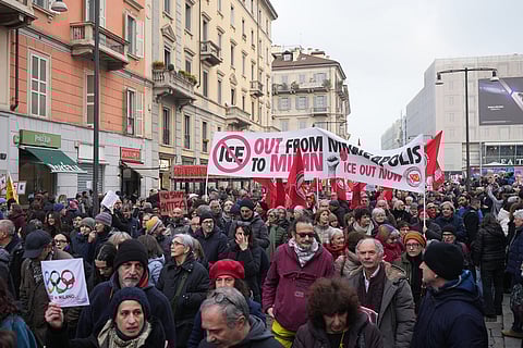 People take part in an Anti-ICE demonstration, ahead of the 2026 Winter Olympics, in Milan, Italy.