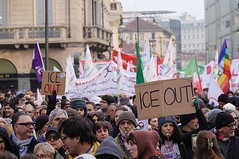 People take part in an Anti-ICE demonstration, ahead of the 2026 Winter Olympics, in Milan, Italy.
