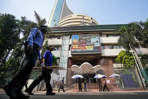 People outside the Bombay Stock Exchange (BSE) building on the day of the ‘Union Budget 2026-27’ presentation, in Mumbai.
