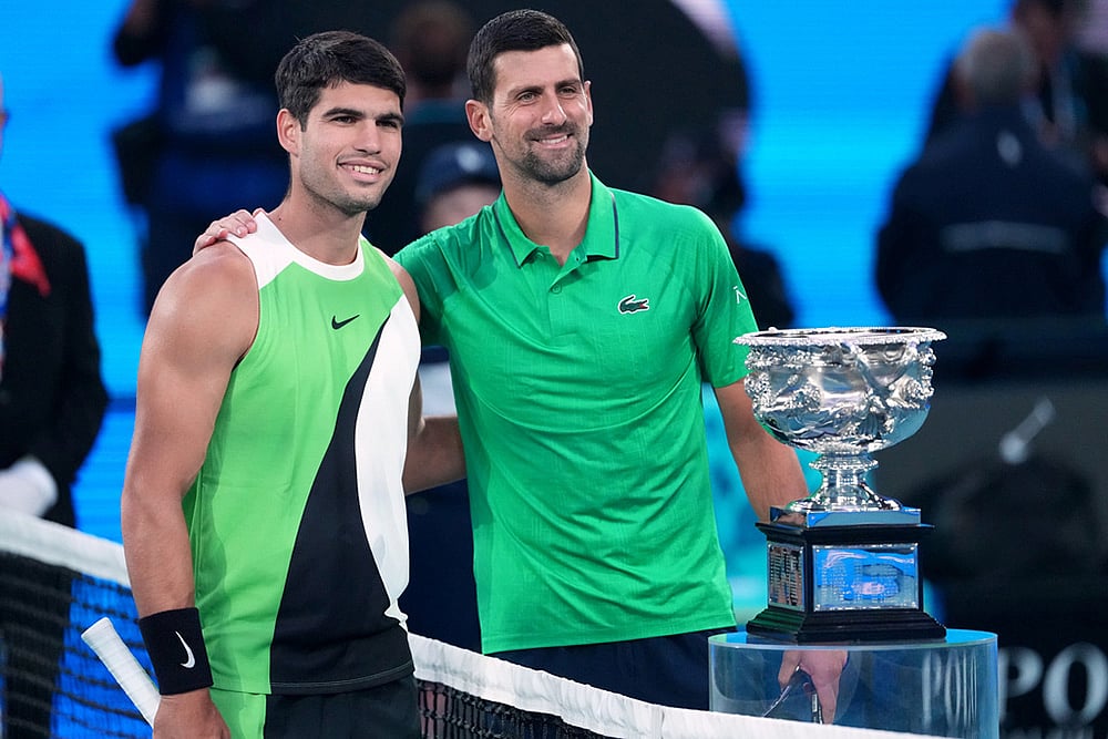 Carlos Alcaraz, left, of Spain and Novak Djokovic, right, of Serbia pose for a photo ahead of the men's singles final at the Australian Open tennis championship in Melbourne, Australia. - | Photo: AP/Aaron Favila