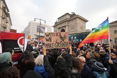People take part in an Anti-ICE demonstration, ahead of the 2026 Winter Olympics, in Milan, Italy.