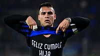 Inter's goalscorer Lautaro Martinez celebrates.