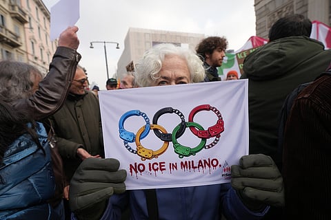 People take part in an Anti-ICE demonstration, ahead of the 2026 Winter Olympics, in Milan, Italy.