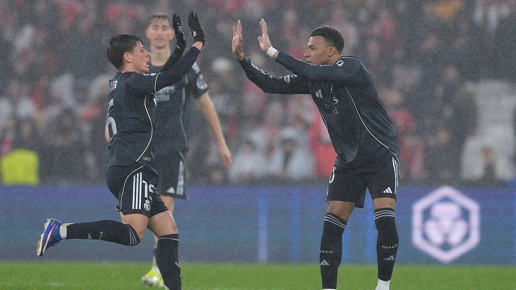 Real Madrid's Kylian Mbappe, right, celebrates with teammate Gonzalo Garcia after scoring his side's second goal during a Champions League match against Benfica. - Photo: AP