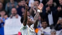 (AP Photo/Manu Fernandez) : Real Madrid's Vinicius Junior celebrates after scoring his side's first goal during the Spanish La Liga soccer match between Real Madrid and Rayo Vallecano in Madrid, Spain, Sunday, Feb. 1, 2026.
