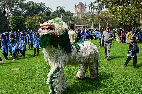 An artist performs Tibetan dance during the 'Kala Ghoda Arts Festival', at Chhatrapati Shivaji Maharaj Vastu Sangrahalaya, in Mumbai.