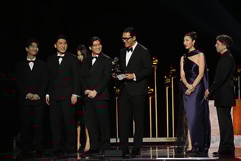 The team from KPop Demon Hunters accept the award for best song written for visual media for "Golden" during the 68th annual Grammy Awards in Los Angeles. 