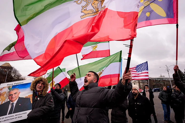 A member of the Iranian community shouts during a rally in support of anti-government protests in Iran, in Bucharest, Romania, Sunday, Feb. 1, 2026. - (AP Photo/Andreea Alexandru)