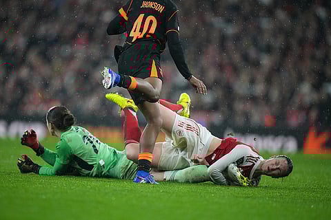 Arsenal's Lotte Wubben-Moy, right, collides with Arsenal's goalkeeper Anneke Borbe during the Women's Champions Cup final soccer match between Arsenal FC and SC Corinthians in London.