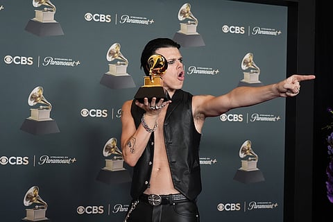 Yungblud poses in the press room with the award for best rock performance for "Changes (Live From Villa Park) Back To The Beginning" during the 68th annual Grammy Awards in Los Angeles. 