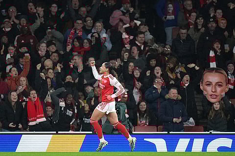 Arsenal's Olivia Smith celebrates after scoring the opening goal during the Women's Champions Cup final soccer match between Arsenal FC and SC Corinthians in London.