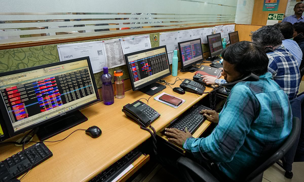 Traders react after fluctuations in stock market, in Kolkata, Sunday, Feb. 1, 2026. Stock market benchmark indices Sensex and Nifty tumbled on Sunday afternoon trade after the Budget proposed to raise Securities Transaction Tax to 0.05 per cent on commodity futures from 0.02 per cent.
 - PTI