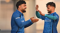 ACBofficials/X : Afghanistan cricketers celebrating a wicket against Scotland in ICC T20 World Cup 2026 warm-up. 