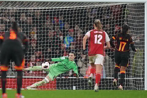 Corinthian's Vic Albuquerque, right, scores her side's second goal from the penalty spot past Arsenal's goalkeeper Anneke Borbe during the Women's Champions Cup final soccer match between Arsenal FC and SC Corinthians in London.