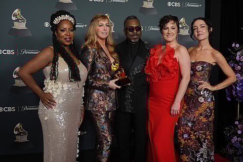 Johnaye Kendrick, from left, Amanda Taylor, Nate Smith, Sara Gazarek, and Erin Bentlage pose in the press room with the award for best arrangement, instruments and vocals for "Big Fish" during the 68th annual Grammy Awards in Los Angeles. 