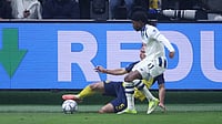 | Photo: AP/Omar Havana : Union SG's Kevin Mac Allister, left, and Atalanta's Ademola Lookman challenge for the ball during the Champions League opening phase soccer match between Union Saint-Gilloise and Atalanta, in Brussels, Wednesday, Jan. 28, 2026.