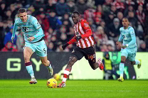 Sunderland's Habib Diarra breaks before scoring during a Premier League soccer match against Burnley at the Stadium of Light in Sunderland.