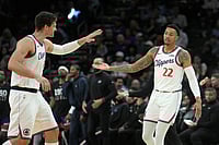 | Photo: AP/Ross D. Franklin : Los Angeles Clippers guard Jordan Miller (22) celebrates a 3-pointer against the Phoenix Suns with Clippers center Brook Lopez during the second half of an NBA basketball game in Phoenix. 