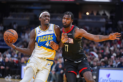 Indiana Pacers forward Pascal Siakam (43) drives on Houston Rockets forward Tari Eason (17) during the first half of an NBA basketball game in Indianapolis.