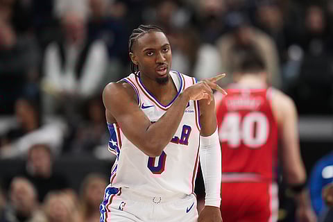 Philadelphia 76ers guard Tyrese Maxey (0) celebrates his three-point basket during the second half of an NBA basketball game against the Los Angeles Clippers in Inglewood, California.
