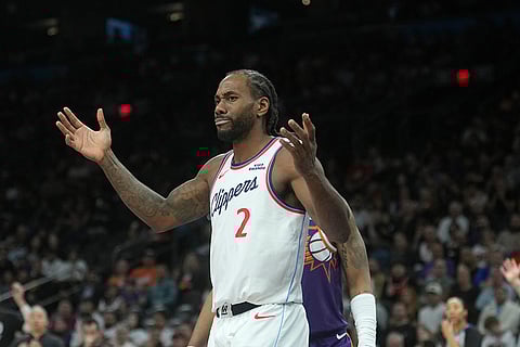 Los Angeles Clippers forward Kawhi Leonard looks for a foul to be called by officials during the second half of an NBA basketball game against the Phoenix Suns in Phoenix. 