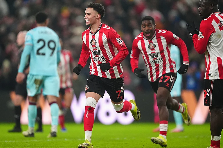 Sunderland's Chemsdine Talbi, left, celebrates scoring their side's third goal of the game during the Premier League soccer match against Burnley, at the Stadium of Light, in Sunderland, England. - | Photo: Owen Humphreys/PA via AP