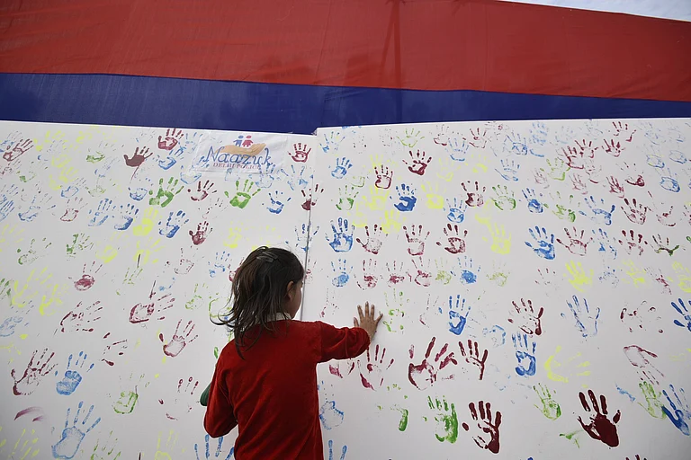 A girl seen putting her handprint over an installation during an awareness campaign program initiated by Delhi Police for those children who were missing and kidnapped but later been reunited, at DCP Complex, on February 21, 2019 in New Delhi, India. Over 130 missing children were reunited with their families by the Anti-Human Trafficking Unit (AHTU) of northeast district police in 2018 and 2019. (Photo by Biplov Bhuyan Hindustan Times)
Source: IMAGO / Hindustan Times
- null